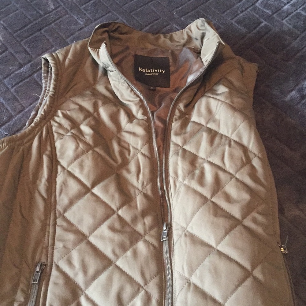 Olive green vest.